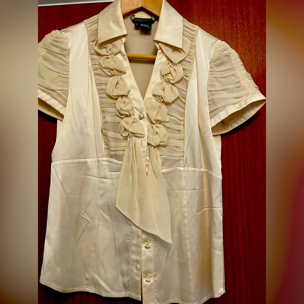 Cream colored silk blouse